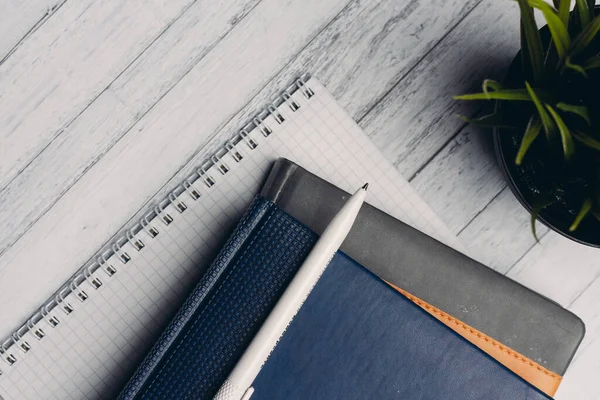 notepads documents desktop office close-up pen objects from above