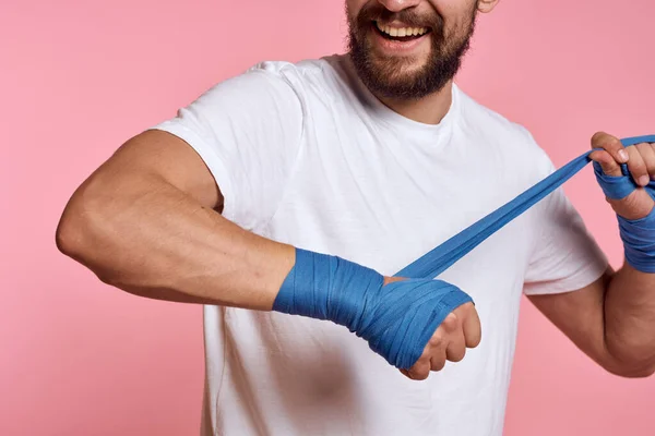 sports man boxing bandage pink workout background