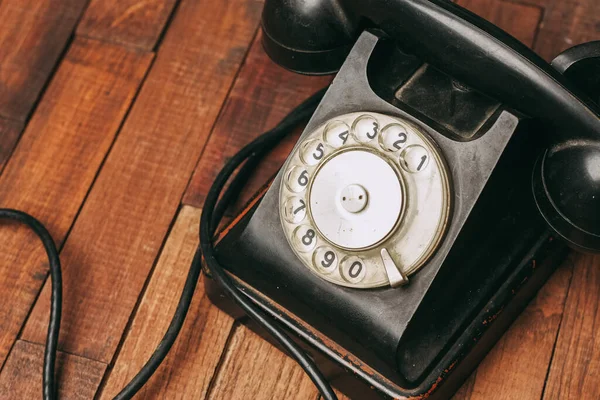 retro telephone nostalgia old technology communication wooden background