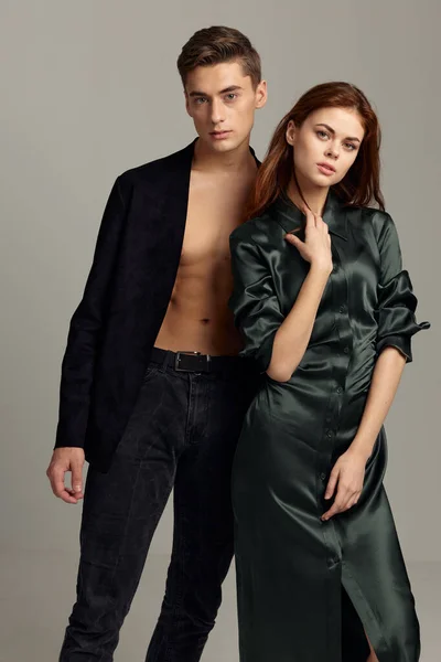 Man and woman stand side by side fashion luxury elegant style relationship romance