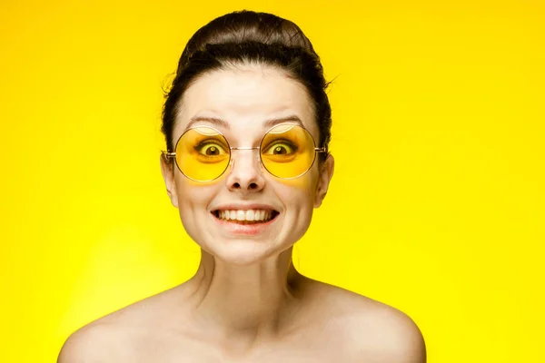 Brunette naked shoulders glasses emotions attractive look — Stock Photo, Image