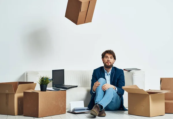 man with boxes packing dismissal job professional