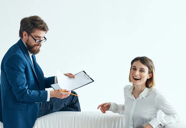 Business man and woman officials colleagues at work office message