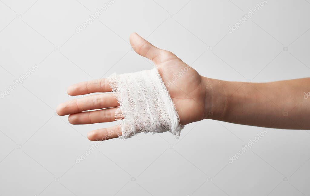 hand injury bandage health problems gray background