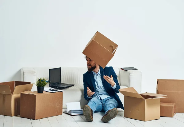 man with boxes packing dismissal job professional