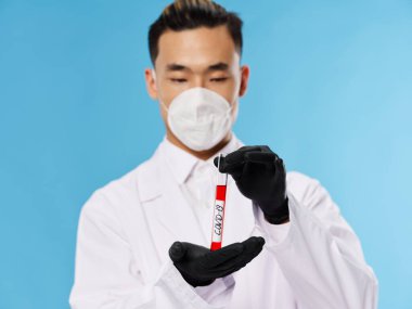 Asya erkek koruyucu giysi kan testi covid-19 siyah eldiven