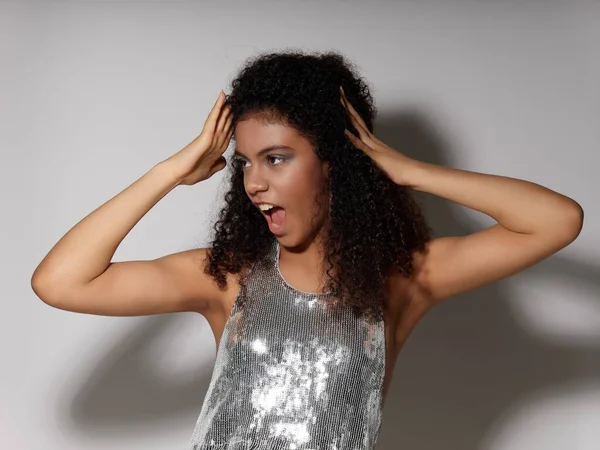 Woman in trendy silver dress party disco hairstyle model — Stock Photo, Image