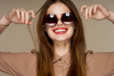 fashionable woman with glasses smile attractive look close-up