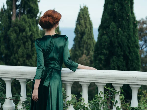 Ever green dress outdoors walking green trees luxury elegant style