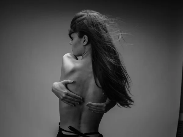 Portrait of woman nude back back view rib model — Stock Photo, Image