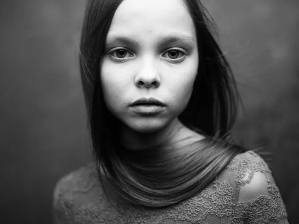 Gray photo of a girl in a cropped view of a dress — Stock Photo, Image