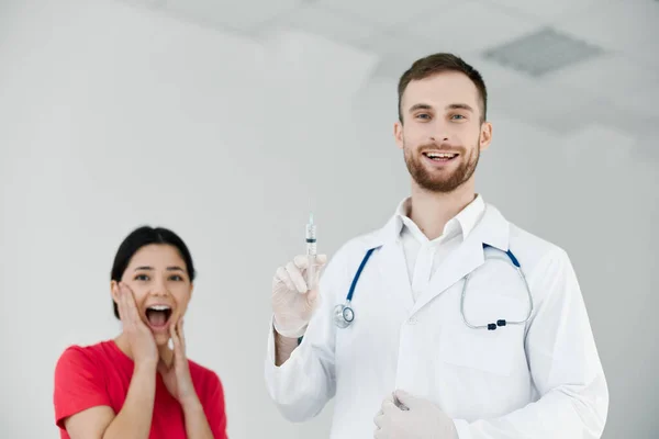 Patient with open mouth is afraid of injections vaccination emotions — Stockfoto