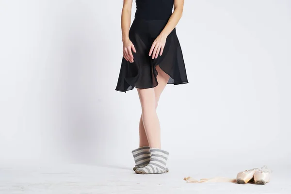 Ballerina gambe a righe calze e scarpe da punta danza luce modello di sfondo — Foto Stock