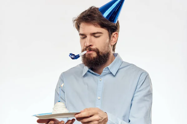 Happy guy with birthday cake white background Compact corporate party cropped beard view