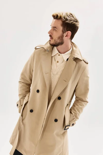 handsome man fashion hairstyle coat modern style isolated background