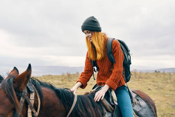 Woman tourist sitting on horse fresh air adventure ride — Stock Photo, Image