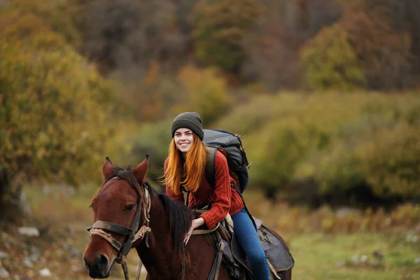 Pretty woman in nature walk fun horse with travel — Stock Photo, Image