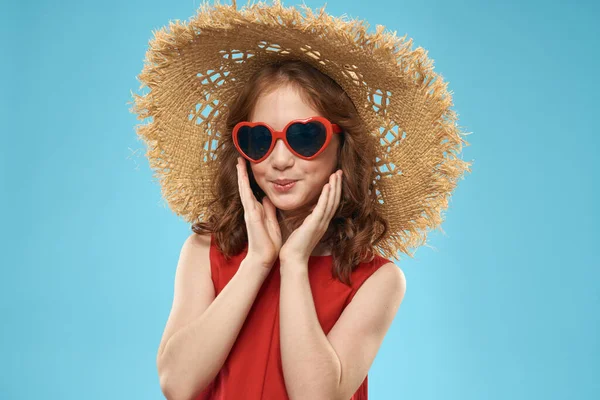 Girl in a beach Straw hat in sunglasses curly hair fun blue background — Stock Photo, Image