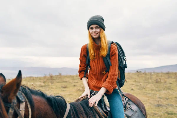 Woman tourist sitting on horse fresh air adventure ride — Stock Photo, Image