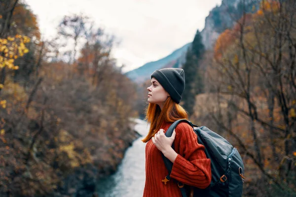 Cheerful woman outdoors backpack mountains river fresh air — Stock Photo, Image