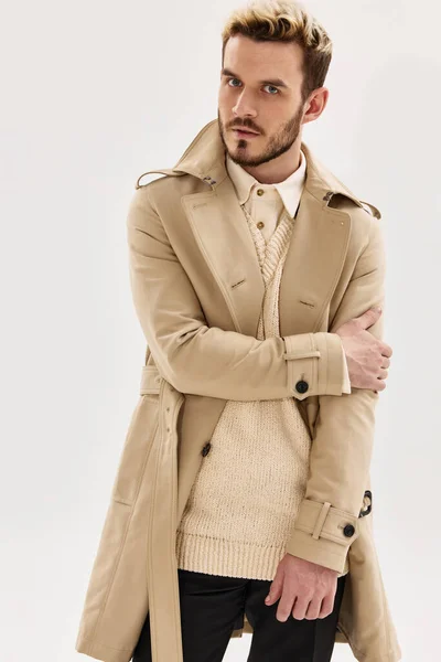 man trendy hairstyle coat modern style autumn fashion