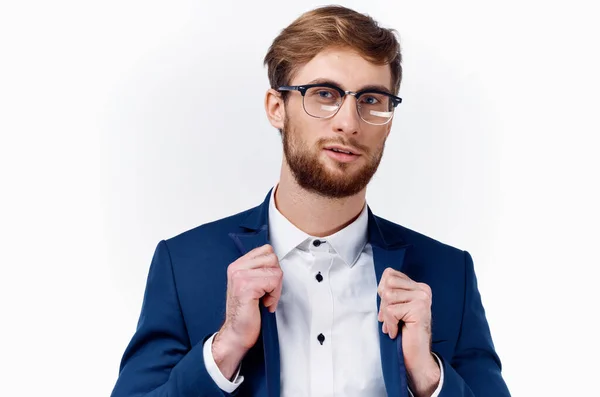 Business man in white shirt straightens his jacket and bushy beard model light background — Stock Photo, Image