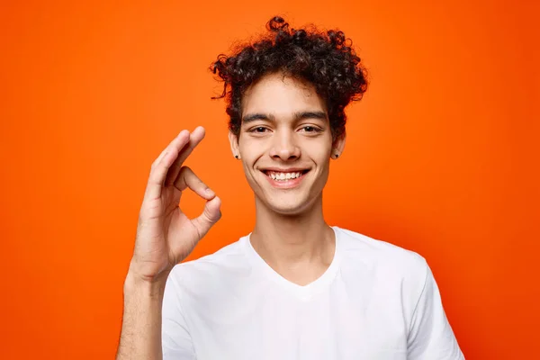 cute guy gesturing with hand emotions modern style orange background