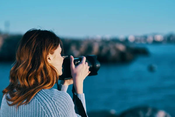 Woman outdoors and professional camera rocky mountains landscape fresh air — Stock Photo, Image