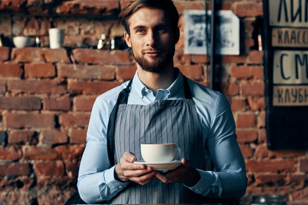 male waiter service a cup of coffee ordering professional