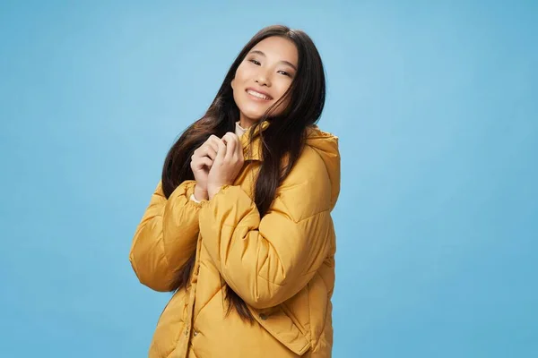 woman asian appearance winter jacket smile lifestyle isolated background