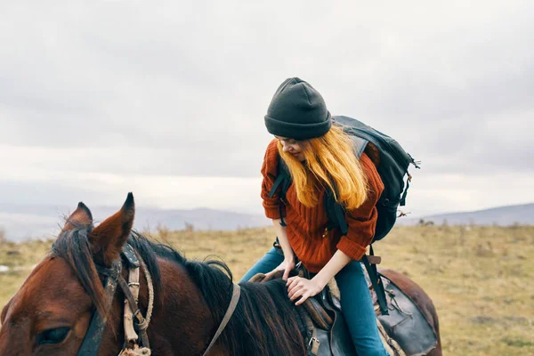 Woman tourist sitting on horse fresh air adventure ride — Stock Photo, Image