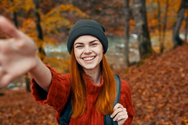 Energetic Woman Tourist Backpack Red Sweater Autumn Forest — Stock Photo, Image