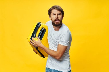 a man with a suitcase in the hands of a passenger airport flight