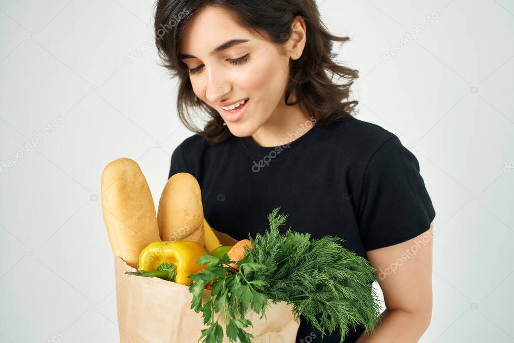 woman with package of groceries delivery service supermarket