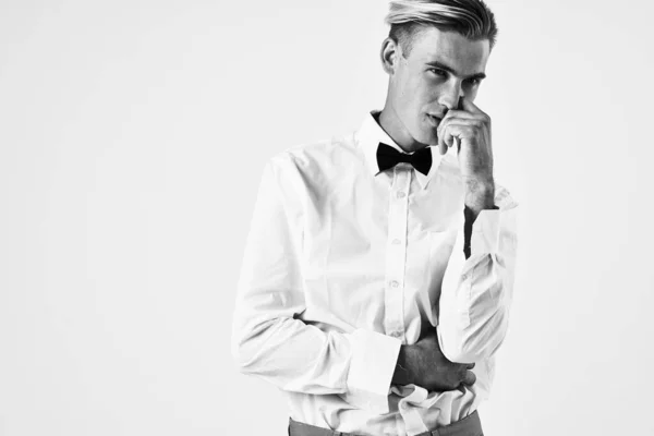 Handsome man fashion hairstyle white shirt posing black and white photo — Stock Photo, Image