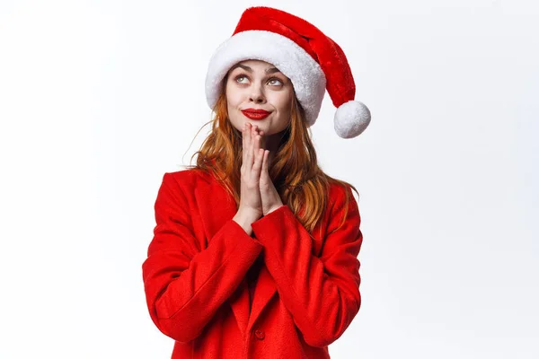 Kvinna i tomte hatt poserar känslor studio jul — Stockfoto