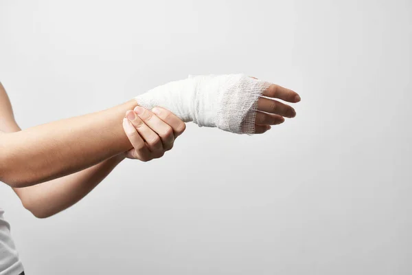 Bandaged arm injury fracture health problems treatment — Stock Photo, Image