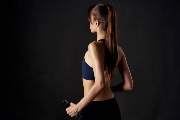 Atletische vrouw slank figuur sportschool fitness — Stockfoto