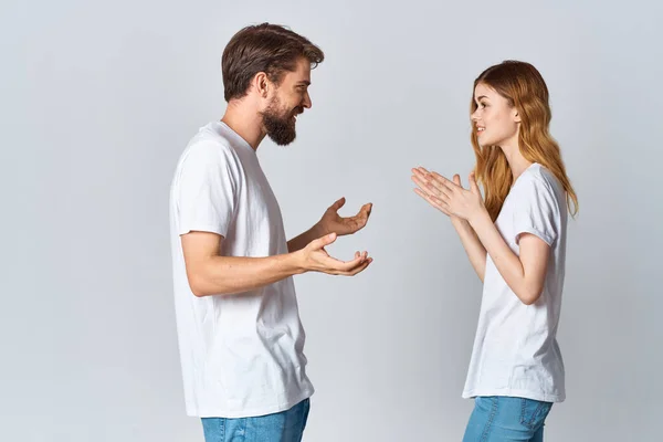 Man and woman in white t-shirts design studio back view mocap — Stock Photo, Image