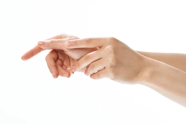 Kéz krém masszázs bőrápolás közelkép egészségügyi fény háttér — Stock Fotó