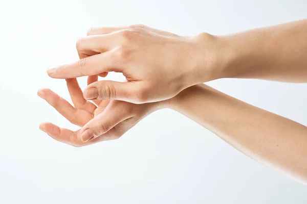 Female hands skin care moisturizing medicine close-up — Stock Photo, Image
