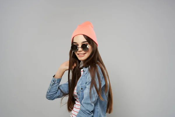 Woman in pink hat sunglasses posing long hair fashion — Stock Photo, Image