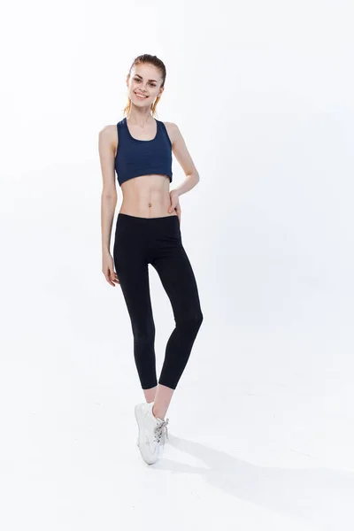 Athletic woman jumping exercise cardio gym — Stock Photo, Image