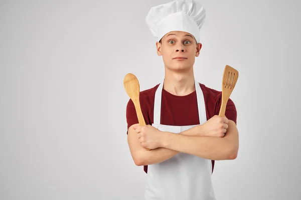 male chef wearing white apron kitchenware cooking restaurant