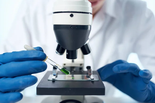 woman microscope biotechnology research laboratory science