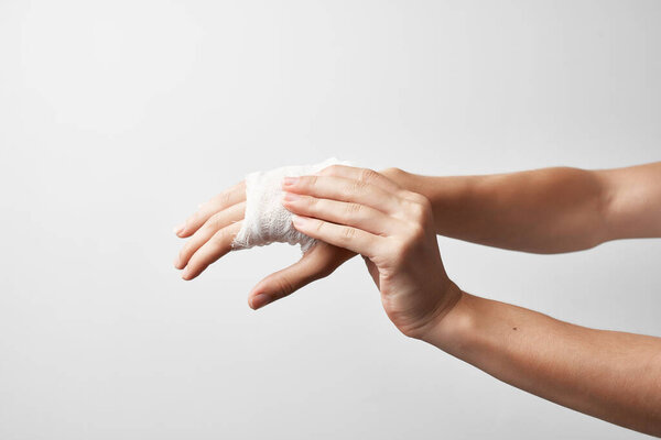 injured bandaged hand  treatment
