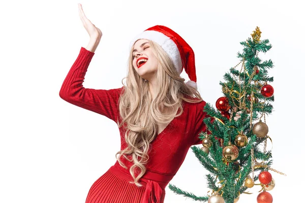 Woman dressed as santa claus christmas tree holiday christmas — Stock Photo, Image