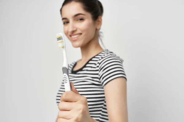Brunette Striped Shirt Brushing Her Teeth Bathroom High Quality Photo — Stock Photo, Image