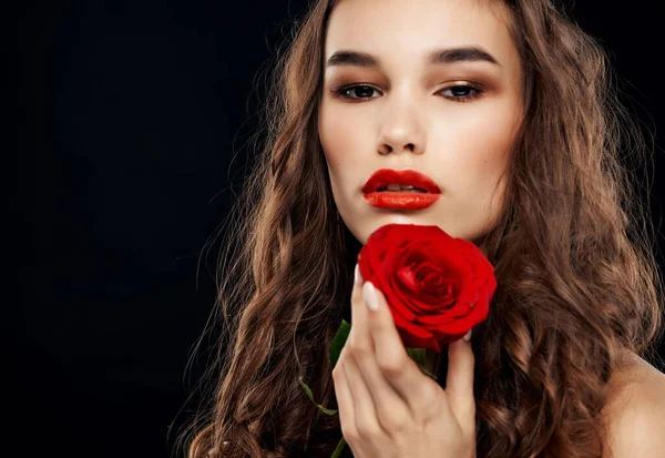 Pretty brunette bright makeup luxury passion red rose — Stock Photo, Image