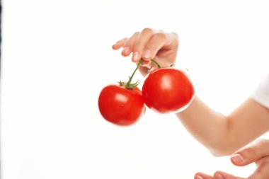 Elde domates, mutfakta salata malzemesi, vitamin.